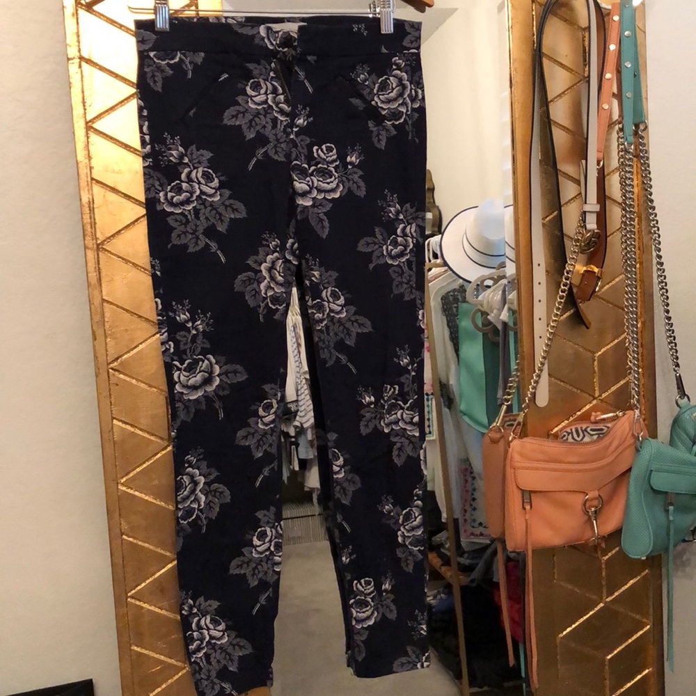 GAP . Navy and white rose skinny khakis.